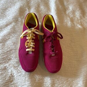Pink and Yellow Nike sneakers